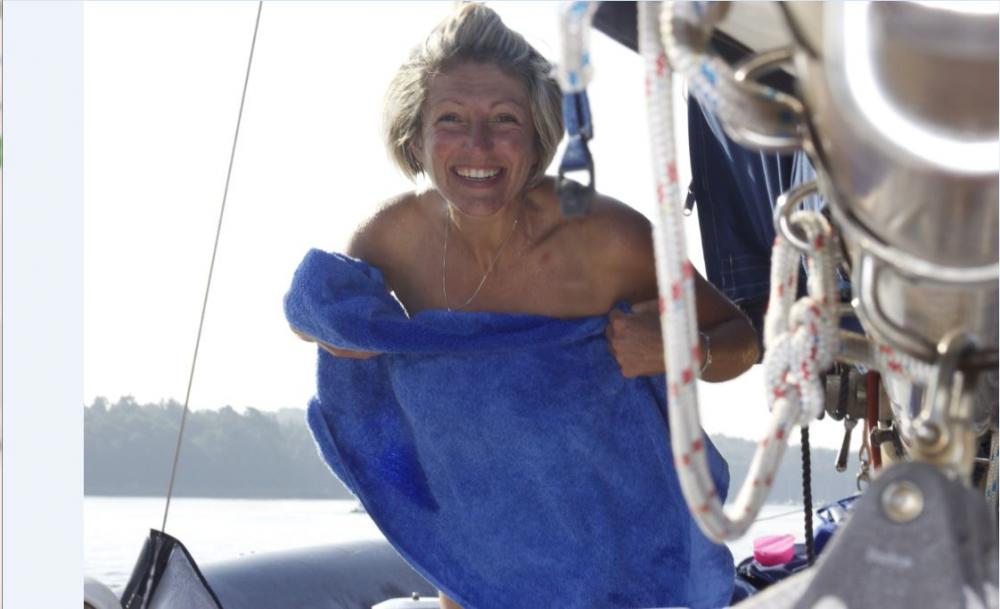 Andrea  showering: caught showering by local fisherman - nearly killed him !